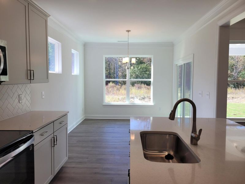 Furnished interior view inside a new home in 1158 Place, Wilson (Image 6).