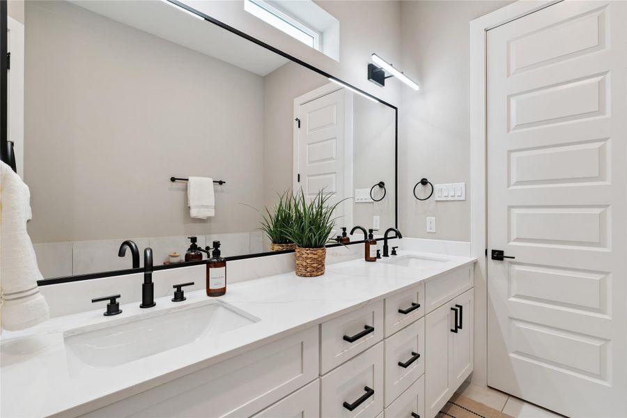 Volume, texture, and light converge in this bath suite—offering both performance and peace.