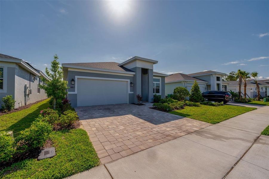 Front exterior of a new home in , Deland, FL, highlighting curb appeal (Image 1). Front exterior of a new home in , Deland, FL, highlighting curb appeal (Image 1).
