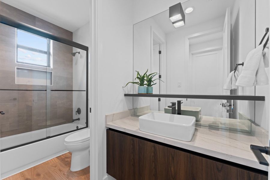 Modern black hardware, floating vanity, and timeless tile — designed for lasting style. Modern black hardware, floating vanity, and timeless tile — designed for lasting style.