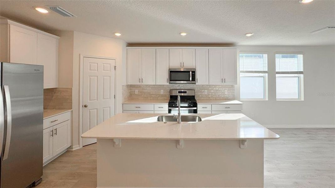 Furnished interior view inside a new home in , St. Cloud (Image 6).
