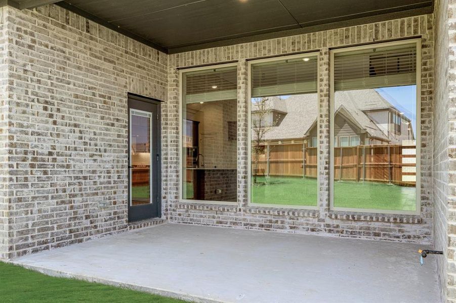 Exterior details and patio area of a home in Creekview Meadows, Pilot Point (Image 4). Exterior details and patio area of a home in Creekview Meadows, Pilot Point (Image 4).
