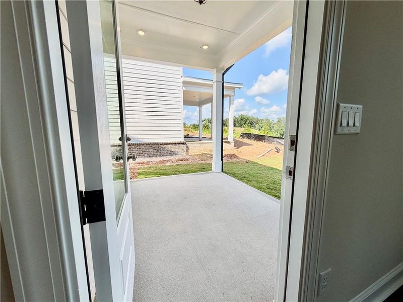 Exterior details and patio area of a home in Palisades Single Family, Cumming (Image 21).