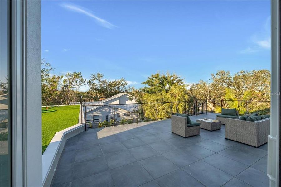 Exterior details and patio area of a home in , Sarasota (Image 33).