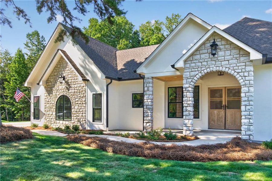 Front exterior of a new home in , Dallas, GA, highlighting curb appeal (Image 23). Front exterior of a new home in , Dallas, GA, highlighting curb appeal (Image 23).