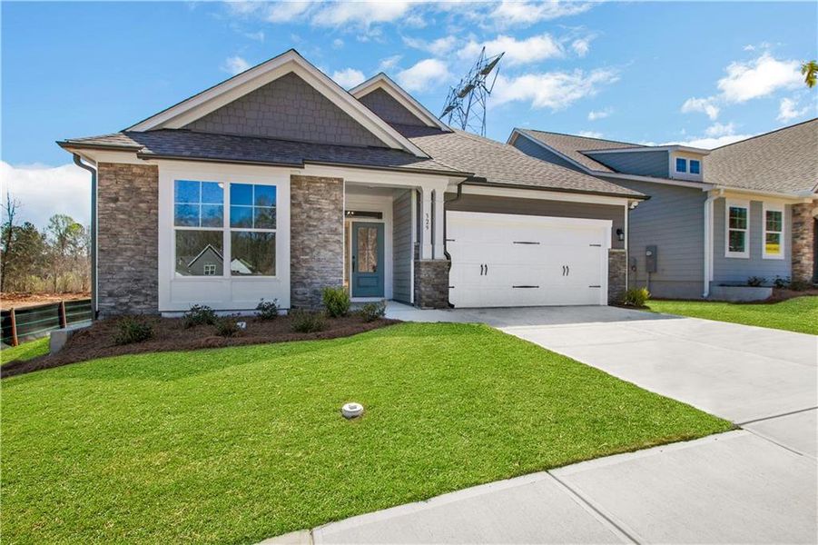 Front exterior of a new home in Marble Tree, Ball Ground, GA, highlighting curb appeal (Image 24). Front exterior of a new home in Marble Tree, Ball Ground, GA, highlighting curb appeal (Image 24).