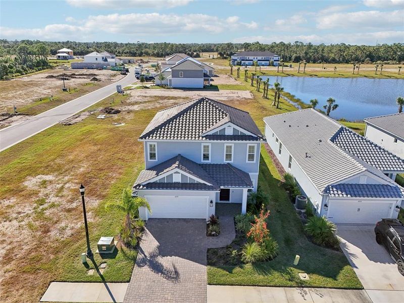 Front exterior of a new home in , Sarasota, FL, highlighting curb appeal (Image 28). Front exterior of a new home in , Sarasota, FL, highlighting curb appeal (Image 28).