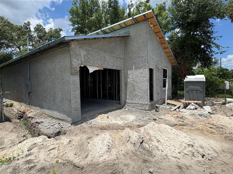 Front exterior of a new home in , Orlando, FL, highlighting curb appeal (Image 10).