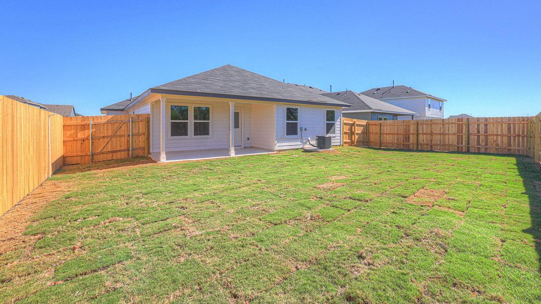Exterior details and patio area of a home in Paramount, Kyle (Image 3). Exterior details and patio area of a home in Paramount, Kyle (Image 3).