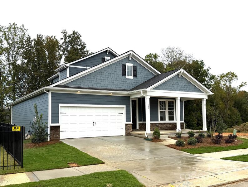 Front exterior of a new home in , Cramerton, NC, highlighting curb appeal (Image 1). Front exterior of a new home in , Cramerton, NC, highlighting curb appeal (Image 1).