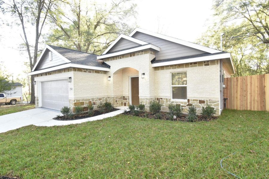 Front exterior of a new home in , Huntsville, TX, highlighting curb appeal (Image 2). Front exterior of a new home in , Huntsville, TX, highlighting curb appeal (Image 2).