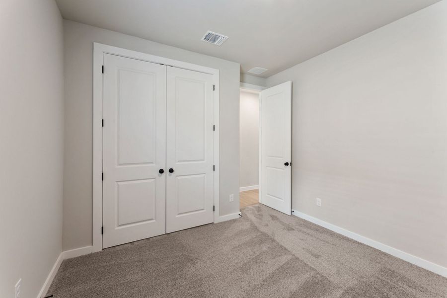 Representative unfurnished interior of a home built from the Pecos by Hakes Brothers in Highland Ridge, New Braunfels (Image 37).