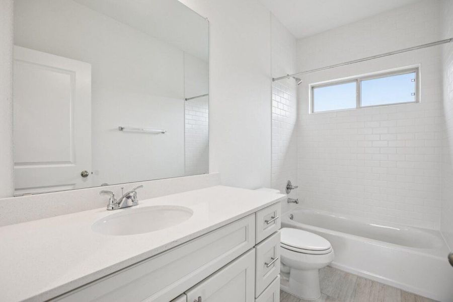 Photos are of a completed model of the same floor plan and are for illustrative purposes only. Actual home is under construction and design selections, materials, and features may differ. Confirm final specifications with the New Home Consultant.