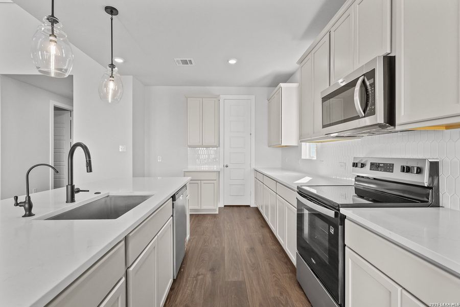 Furnished interior view inside a new home in Megan's Landing, Castroville (Image 8).