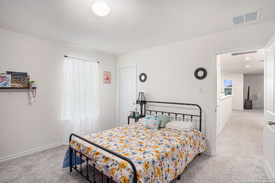 Furnished interior view inside a new home in Medina Crossing, Von Ormy (Image 27).