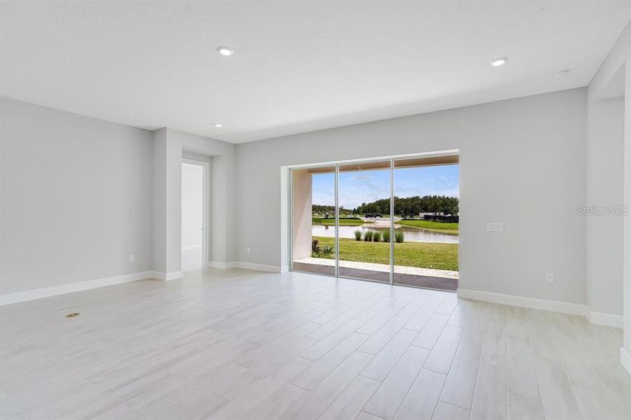 Spacious, unfurnished interior of a new home in Esplanade at Westview, Kissimmee (Image 24).