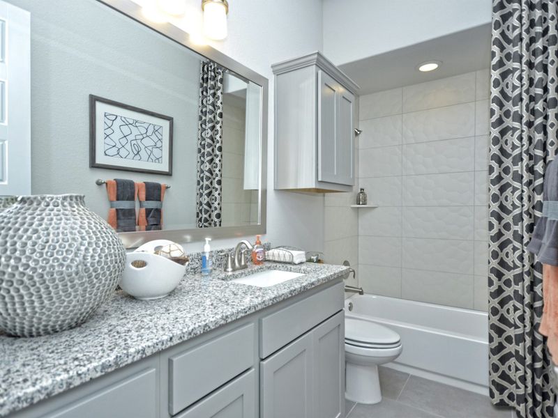 Representative furnished interior of a home built from the San Simeon I by Giddens Homes in Clearwater Ranch, Liberty Hill (Image 214).