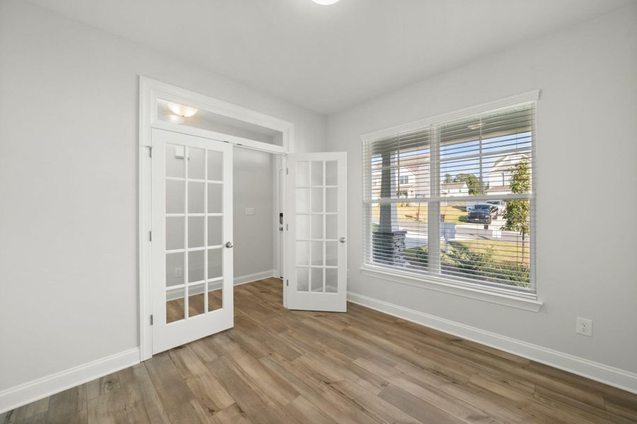 Spacious, unfurnished interior of a new home in Cottages at Piper Village, Trinity (Image 17).