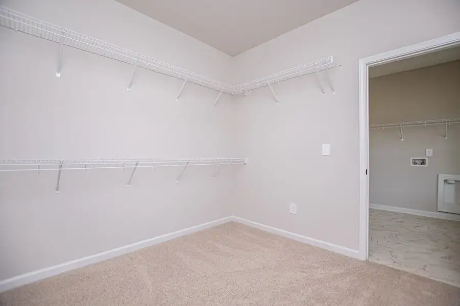 Spacious, unfurnished interior of a new home in WOODMONT RESERVE, Roopville (Image 56).
