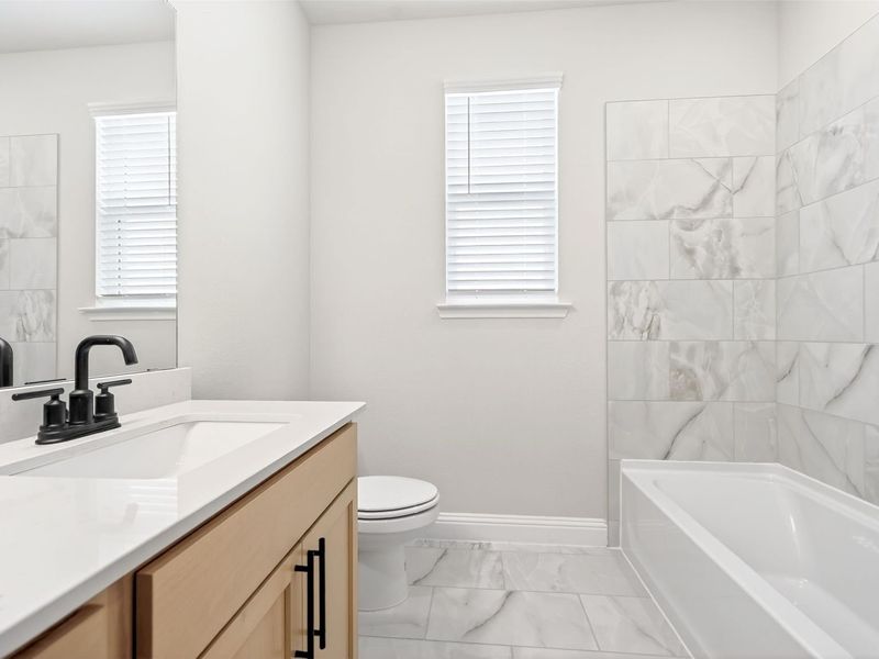 Furnished interior view inside a new home in Parks at Foster Crossing, Anna (Image 15).