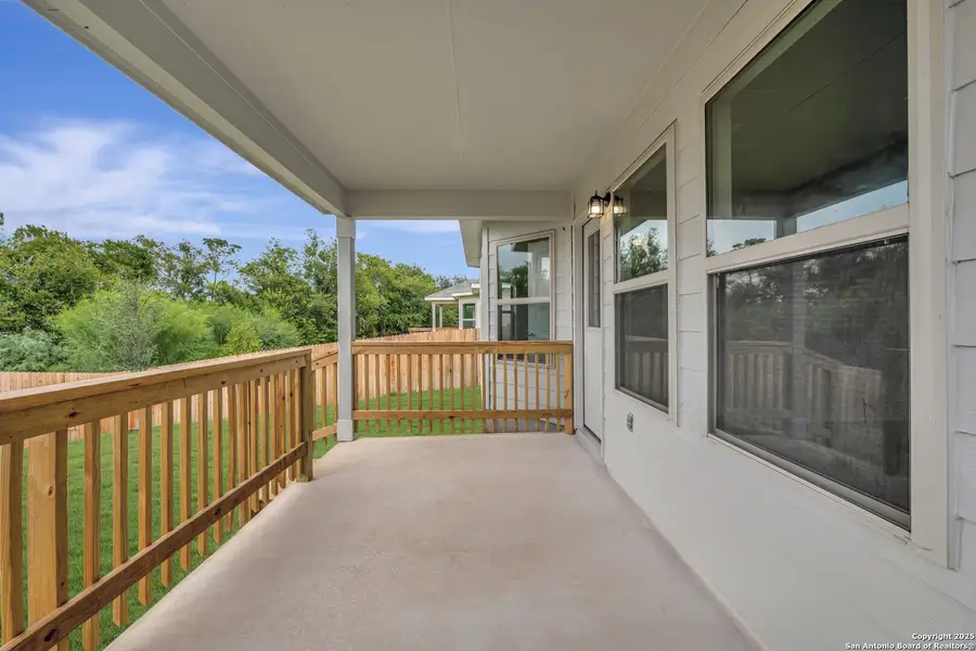 Exterior details and patio area of a home in Winding Brook, San Antonio (Image 23).