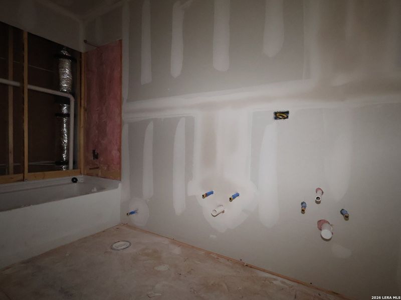 In-progress construction of a new home in Winding Brook, San Antonio, TX (Image 22).