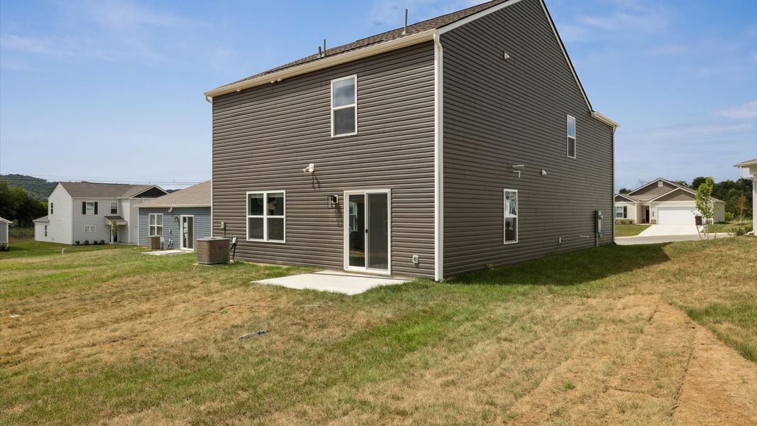 Front exterior of a new home in Belhaven, Knoxville, TN, highlighting curb appeal (Image 2). Front exterior of a new home in Belhaven, Knoxville, TN, highlighting curb appeal (Image 2).