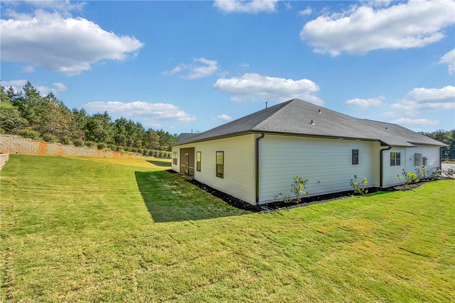 Exterior details and patio area of a home in Edwards Ridge, Central (Image 18).