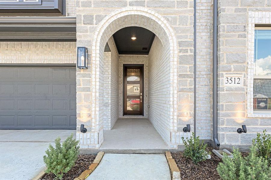 Front exterior of a new home in Ridge Ranch Classic 50, Mesquite, TX, highlighting curb appeal (Image 2). Front exterior of a new home in Ridge Ranch Classic 50, Mesquite, TX, highlighting curb appeal (Image 2).