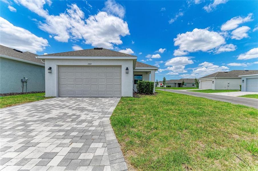 Front exterior of a new home in , Sarasota, FL, highlighting curb appeal (Image 27). Front exterior of a new home in , Sarasota, FL, highlighting curb appeal (Image 27).