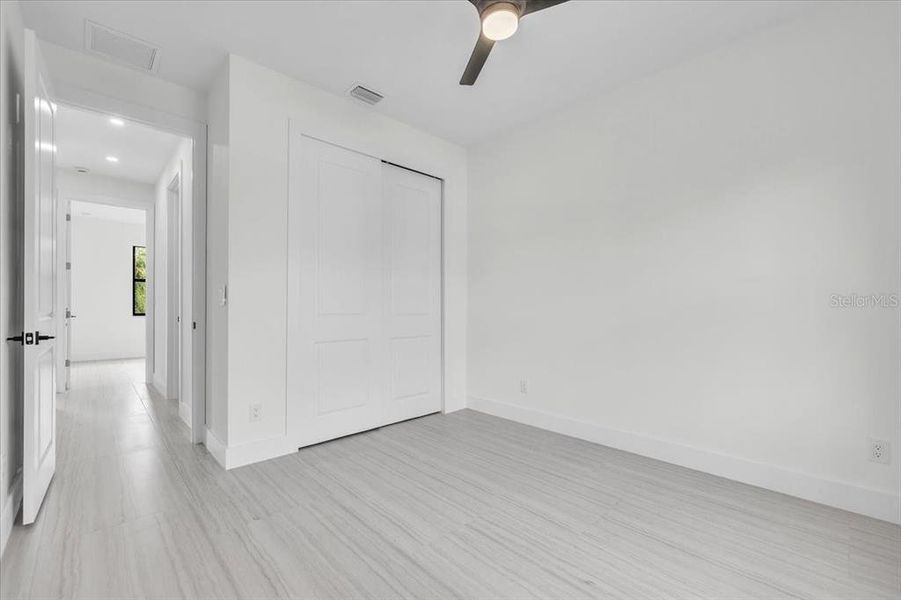 Spacious, unfurnished interior of a new home in , Port Charlotte (Image 27).