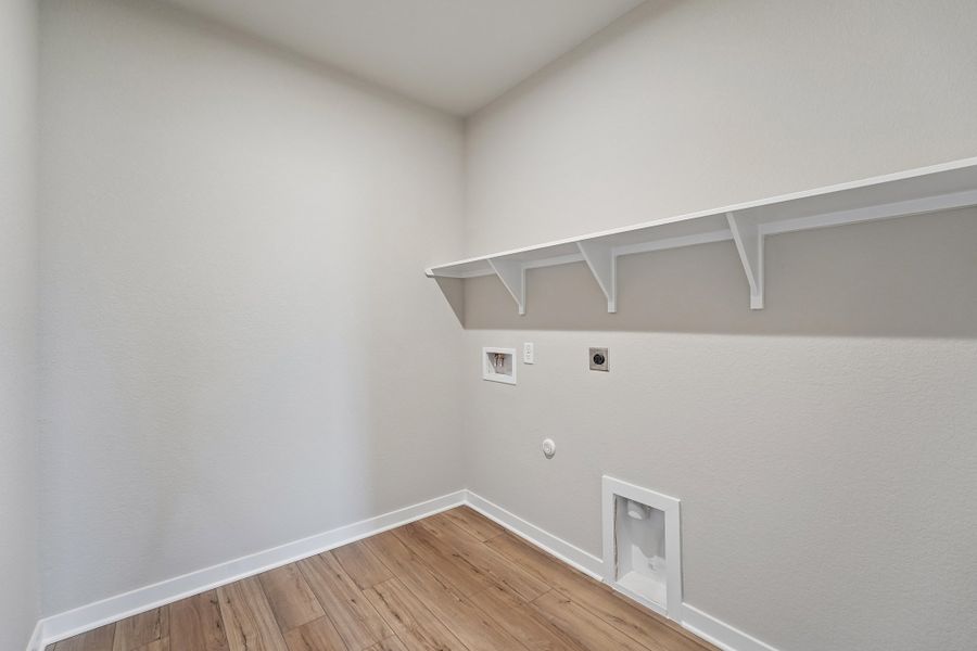 Representative unfurnished interior of a home built from the Guadalupe by Omega Builders in Hillside Village, Temple (Image 8).