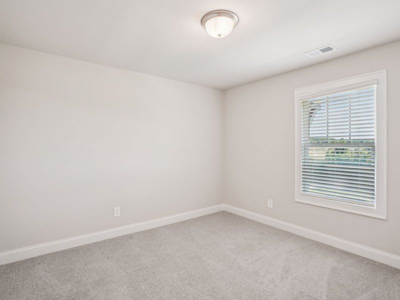 Spacious, unfurnished interior of a new home in Hemingway - Highland Series, Cumming (Image 21).