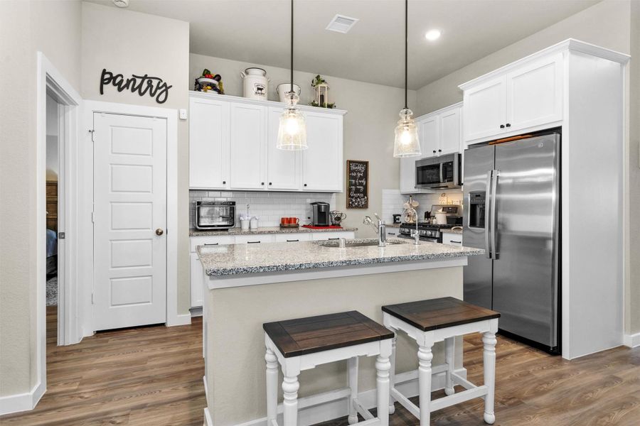 And now we get to see your perfectly designed and thought-out island kitchen. Note; Refrigerator stays with the house. And now we get to see your perfectly designed and thought-out island kitchen. Note; Refrigerator stays with the house.