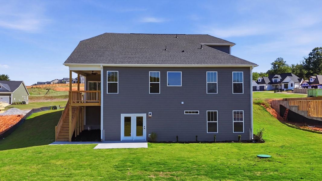 Eye-catching exterior with timeless color palette and superior architectural detail located in Woodruff, SC Eye-catching exterior with timeless color palette and superior architectural detail located in Woodruff, SC