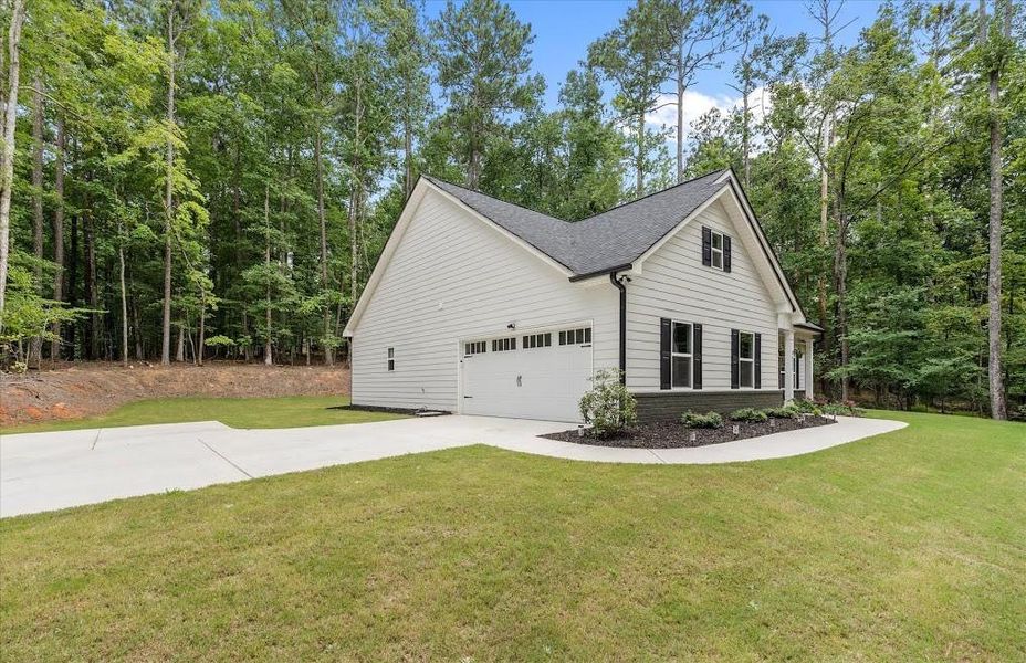 Front exterior of a new home in , Villa Rica, GA, highlighting curb appeal (Image 25).
