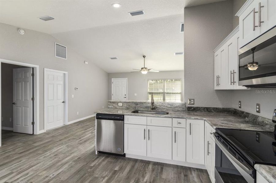 Furnished interior view inside a new home in , Dunnellon (Image 6).