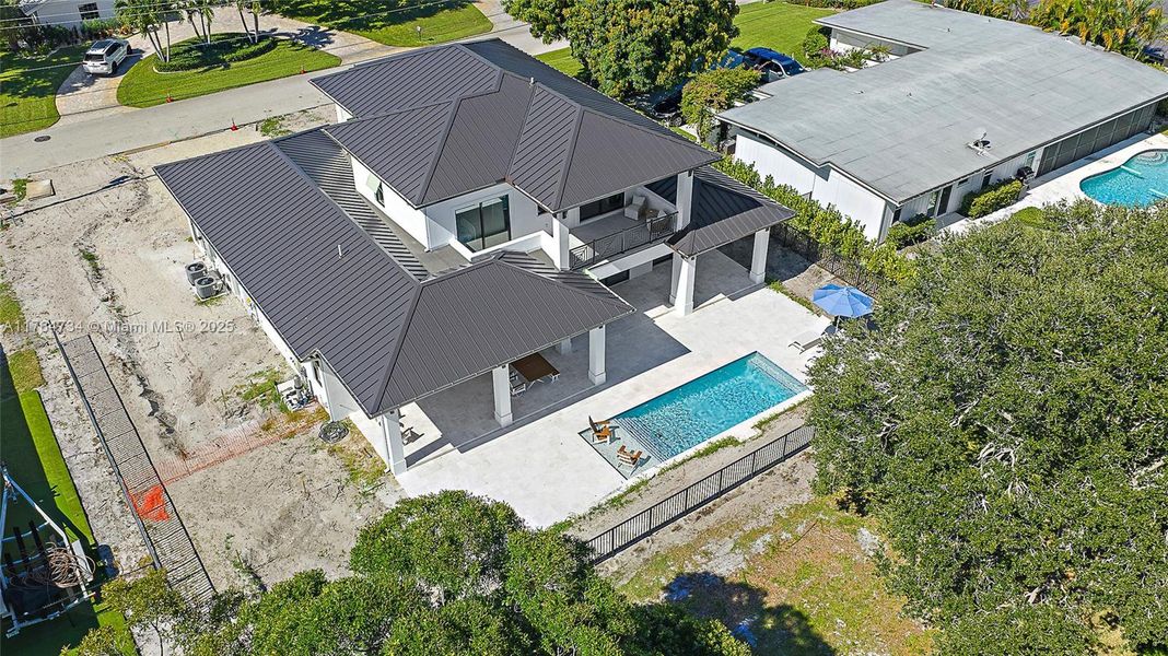Front exterior of a new home in , Tequesta, FL, highlighting curb appeal (Image 1).