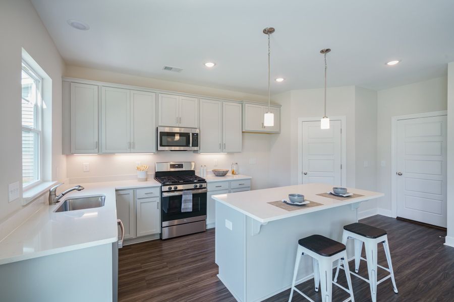 Representative furnished interior of a home built from the The Harrison by Cothran Homes in Holly Ridge, Greenville (Image 10). Representative furnished interior of a home built from the The Harrison by Cothran Homes in Holly Ridge, Greenville (Image 10).
