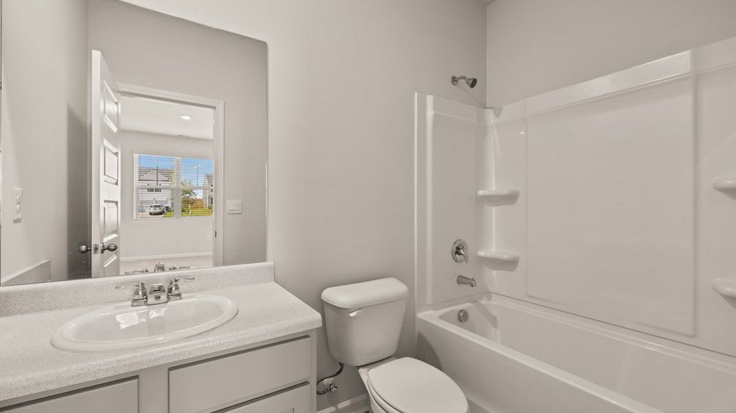 Representative furnished interior of a home built from the Grayson by D.R. Horton in Highland Hills, Graniteville (Image 10).