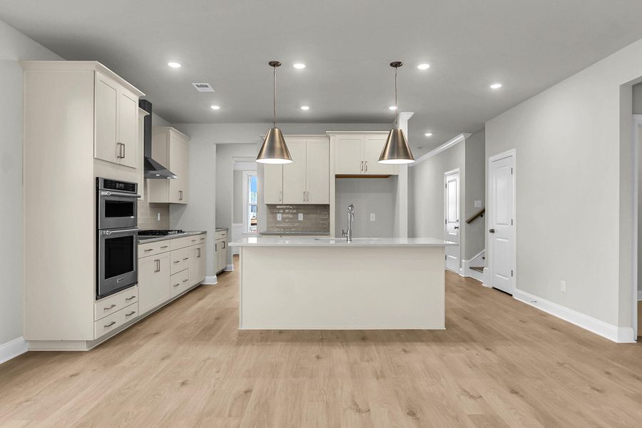 Furnished interior view inside a new home in Tidewater at Lakes of Cane Bay, Summerville (Image 9).