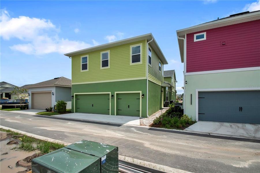 Front exterior of a new home in Laureate Park, Orlando, FL, highlighting curb appeal (Image 21). Front exterior of a new home in Laureate Park, Orlando, FL, highlighting curb appeal (Image 21).