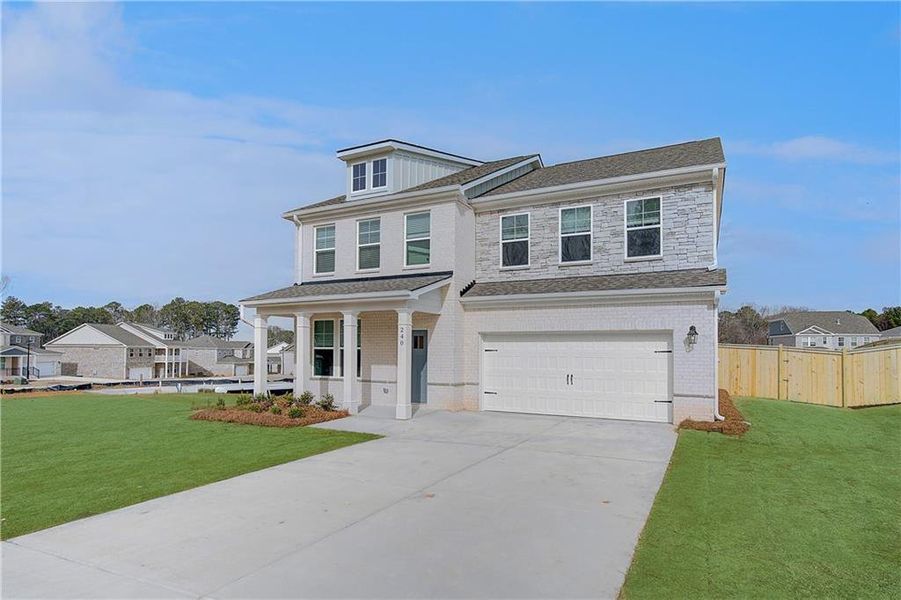 Front exterior of a new home in Burchwood, Stockbridge, GA, highlighting curb appeal (Image 23).