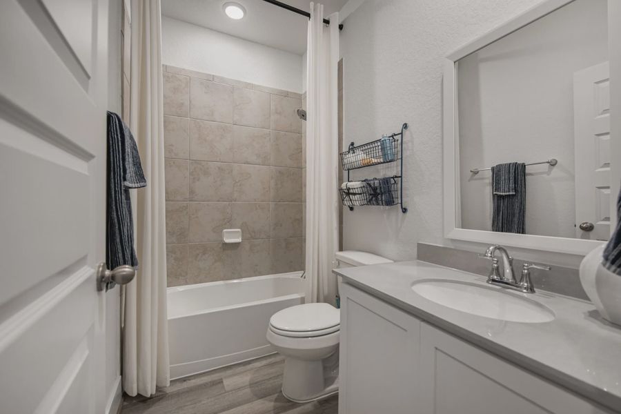 Representative furnished interior of a home built from the Brandy by Chesmar Homes in Buffalo Crossing, Cibolo (Image 23).