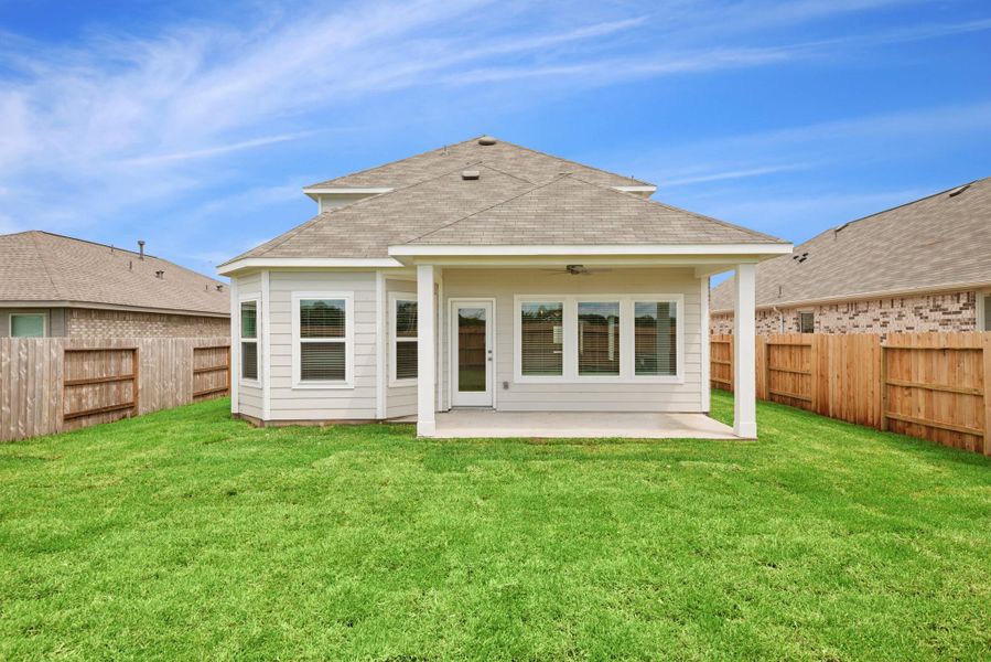 Front exterior of a new home in Miller's Pond, Rosenberg, TX, highlighting curb appeal (Image 2).