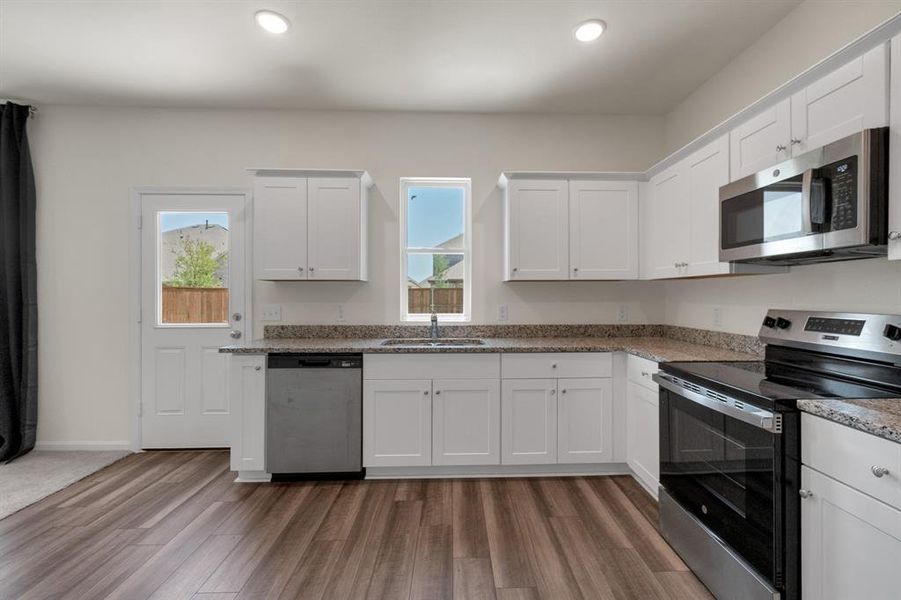Furnished interior view inside a new home in Creekview Fossil Ridge, Pilot Point (Image 9).