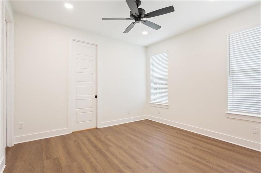 Unfurnished room featuring wood finished floors, recessed lighting, and ceiling fan