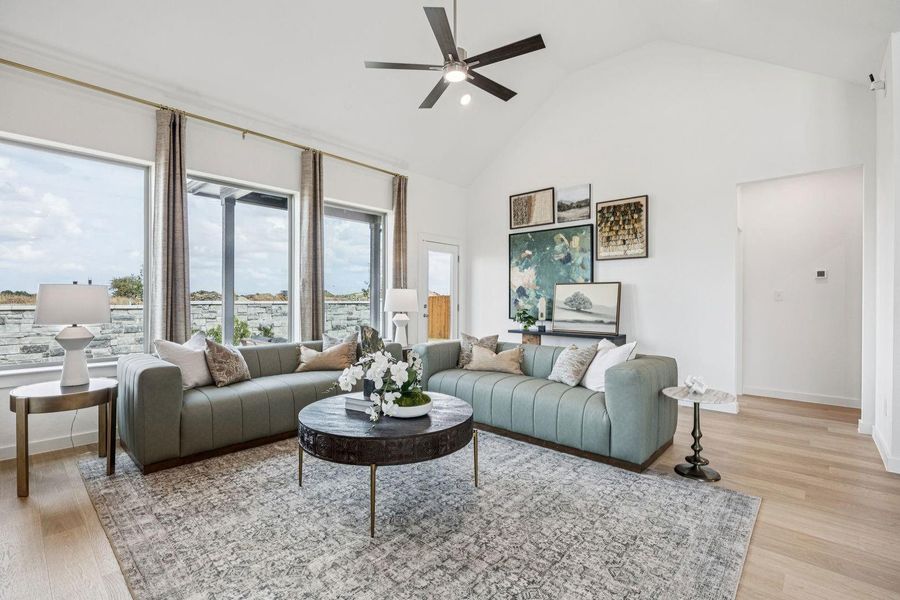 Living Room in the Trinity home plan by Trophy Signature Homes – REPRESENTATIVE PHOTO Living Room in the Trinity home plan by Trophy Signature Homes – REPRESENTATIVE PHOTO