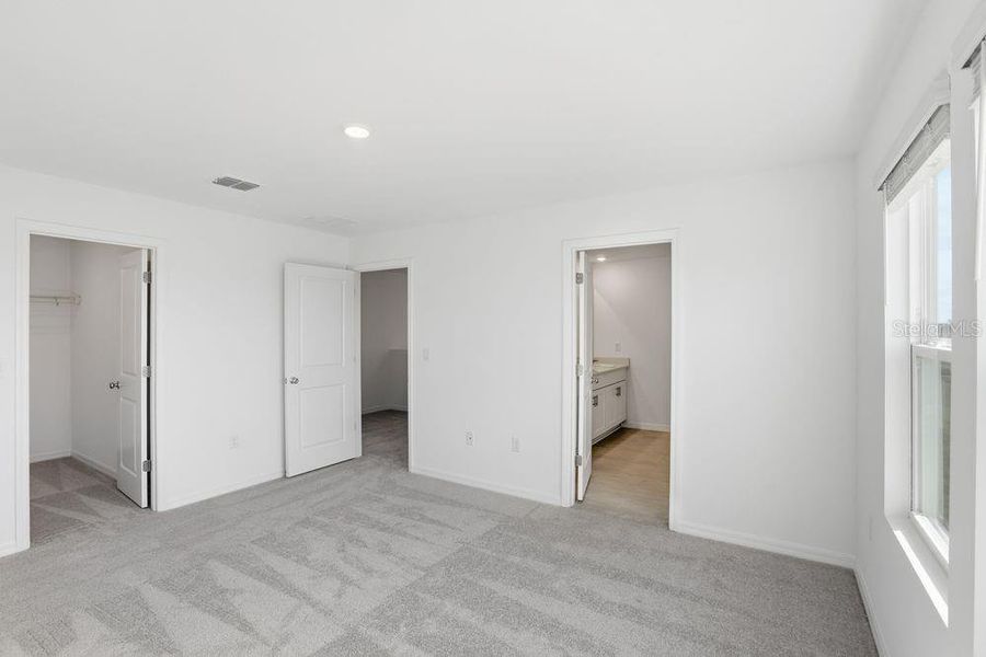 Spacious, unfurnished interior of a new home in Waterstone, Groveland (Image 38).