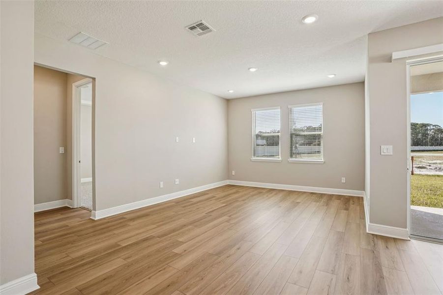 Spacious, unfurnished interior of a new home in Legends Preserve - Signature Series, Daytona Beach (Image 18).